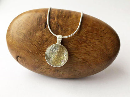 Medium hand cast sterling silver round pendant