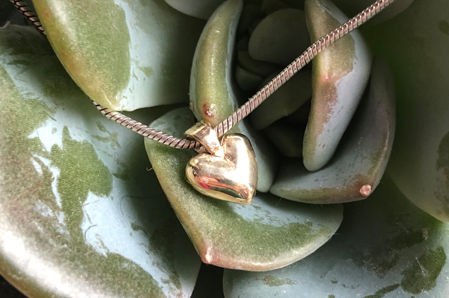 Small hand cast 9ct gold heart pendant