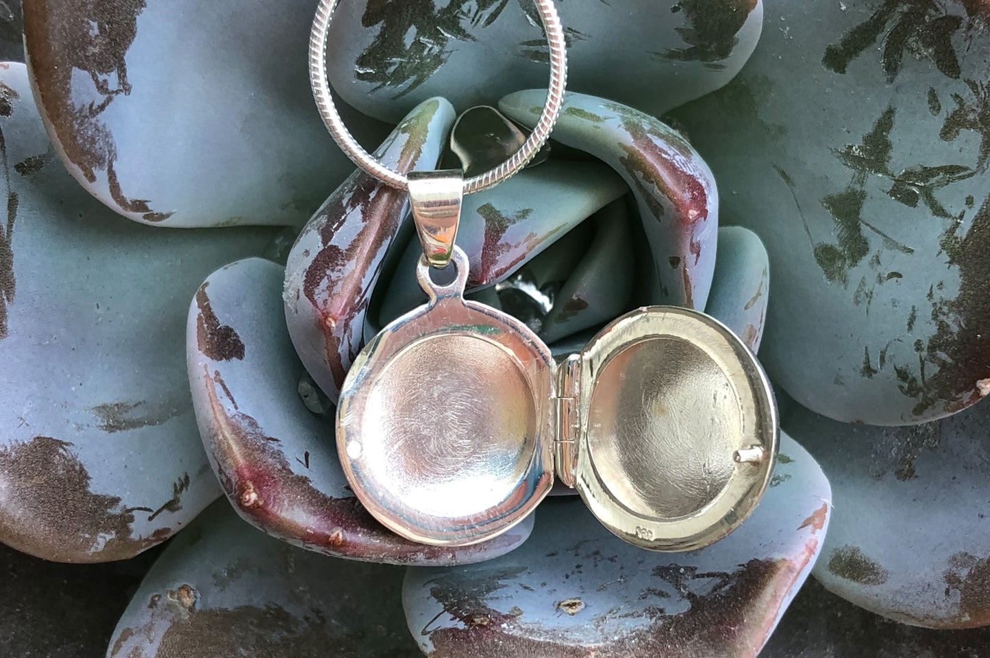 Sterling silver inclusion locket