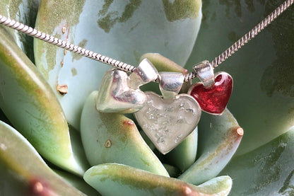Small hand cast solid sterling silver heart pendant