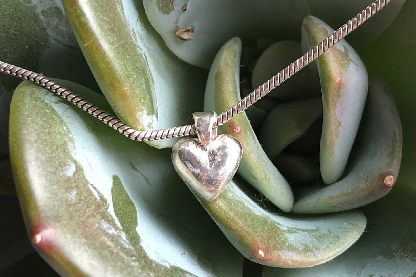 Small hand cast sterling silver heart pendant